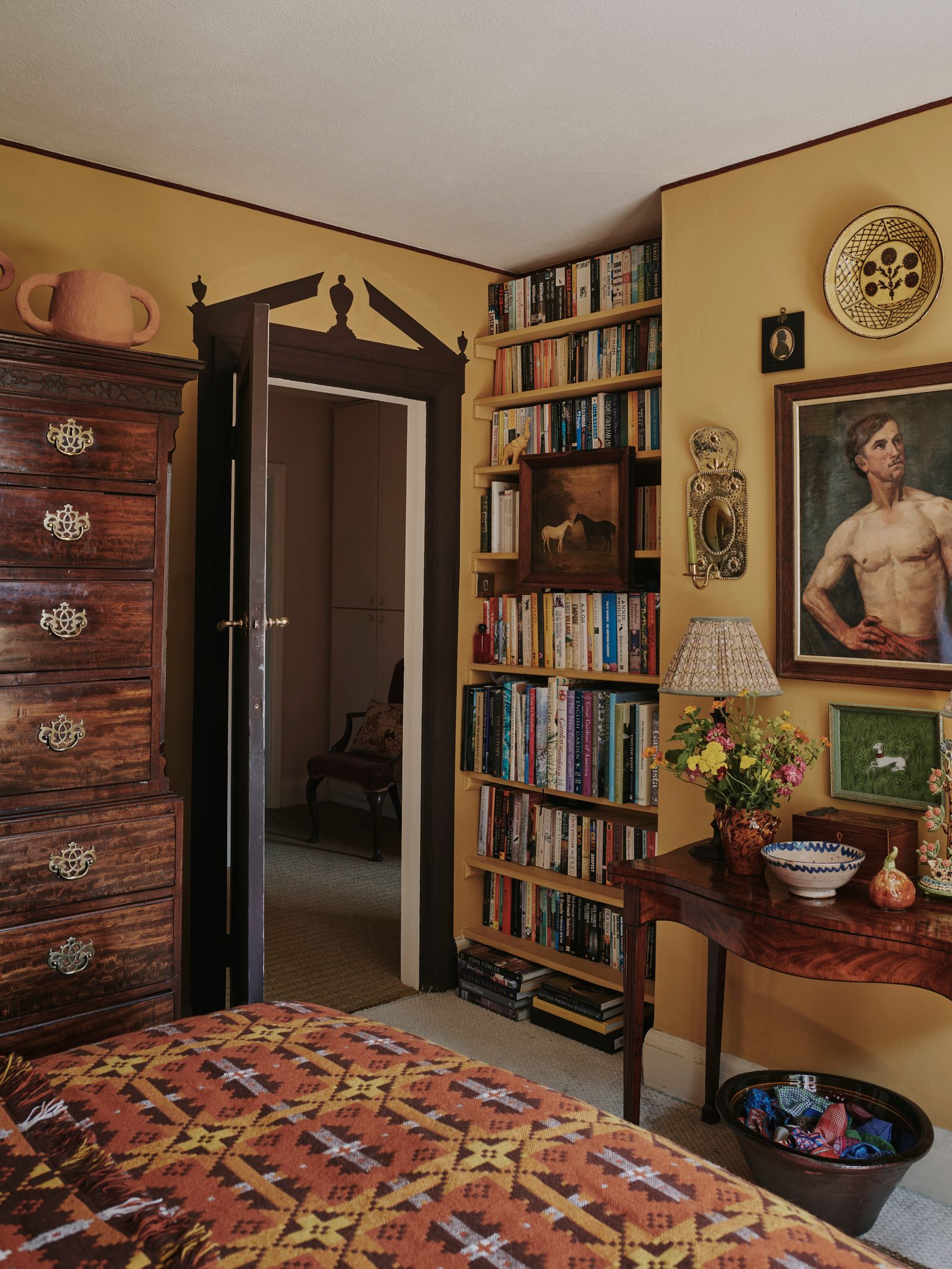 Patrick painted a trompe l'oeil door pediment in Farrow amp Ball's ‘Cola shade in the bedroom of his 1930s house in...