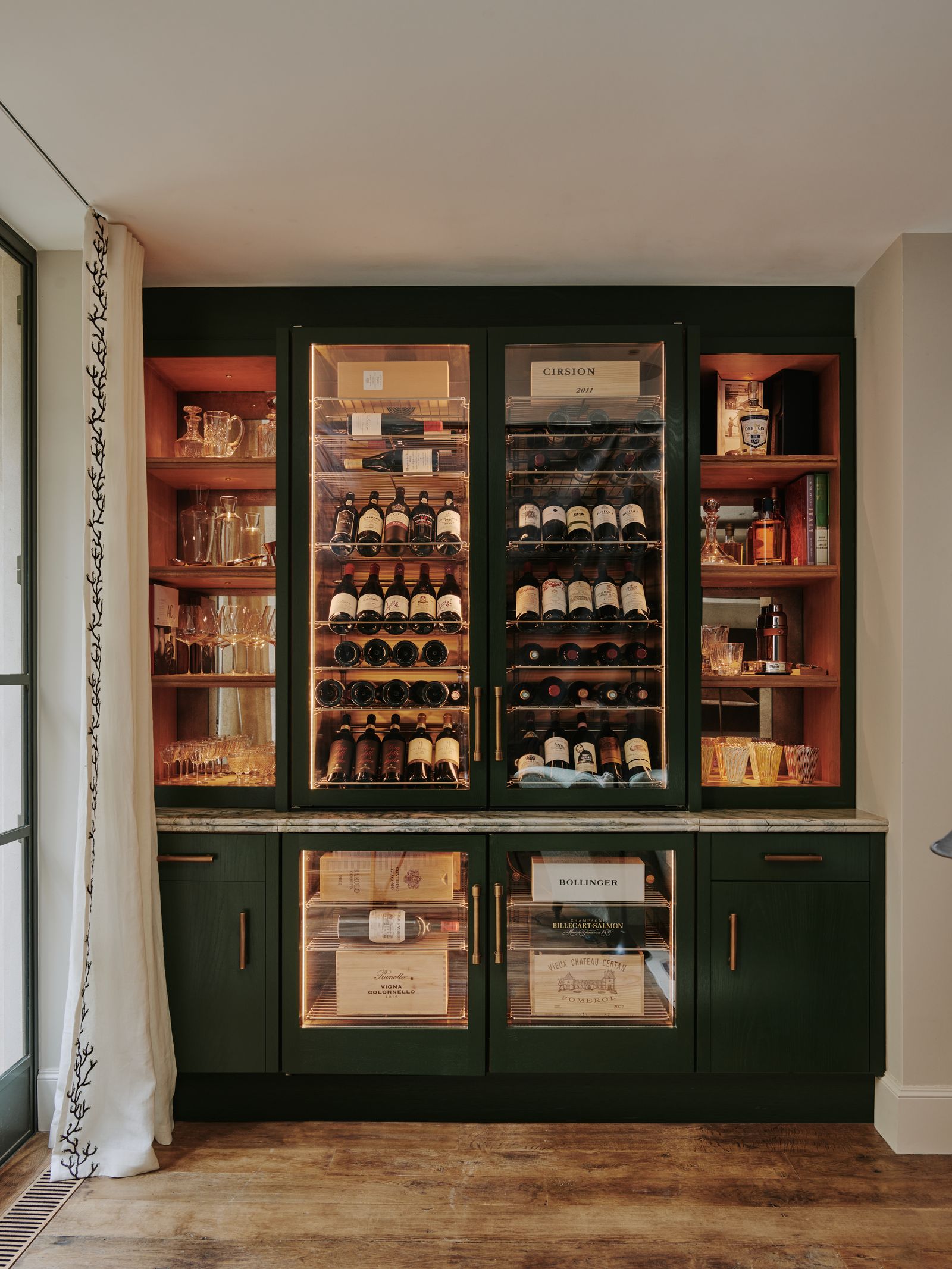 A bespoke wine storage cabinet made by Rupert Bevan.